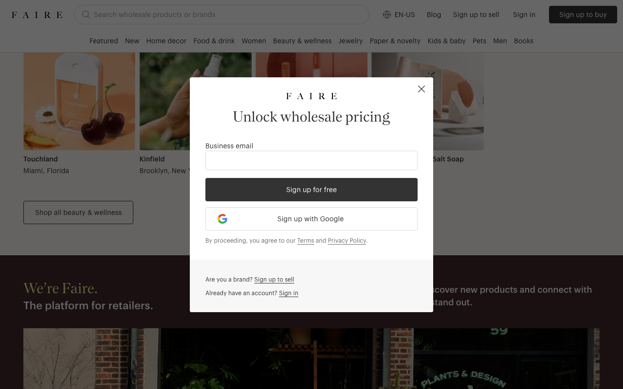 Faire retailer signup on faire.com showing wholesale brands and unlock wholesale pricing